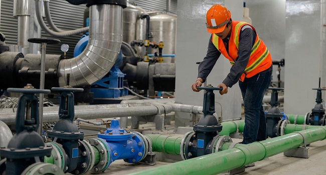 worker turning valve